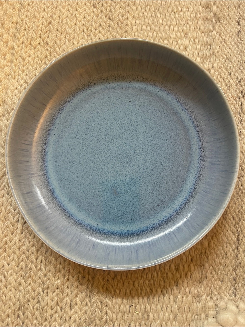 Blue Speckled Shallow Plate Bowl from Anthropologie.